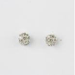 A pair of hallmarked 9ct white and yellow gold cluster stud earrings set with brilliant cut