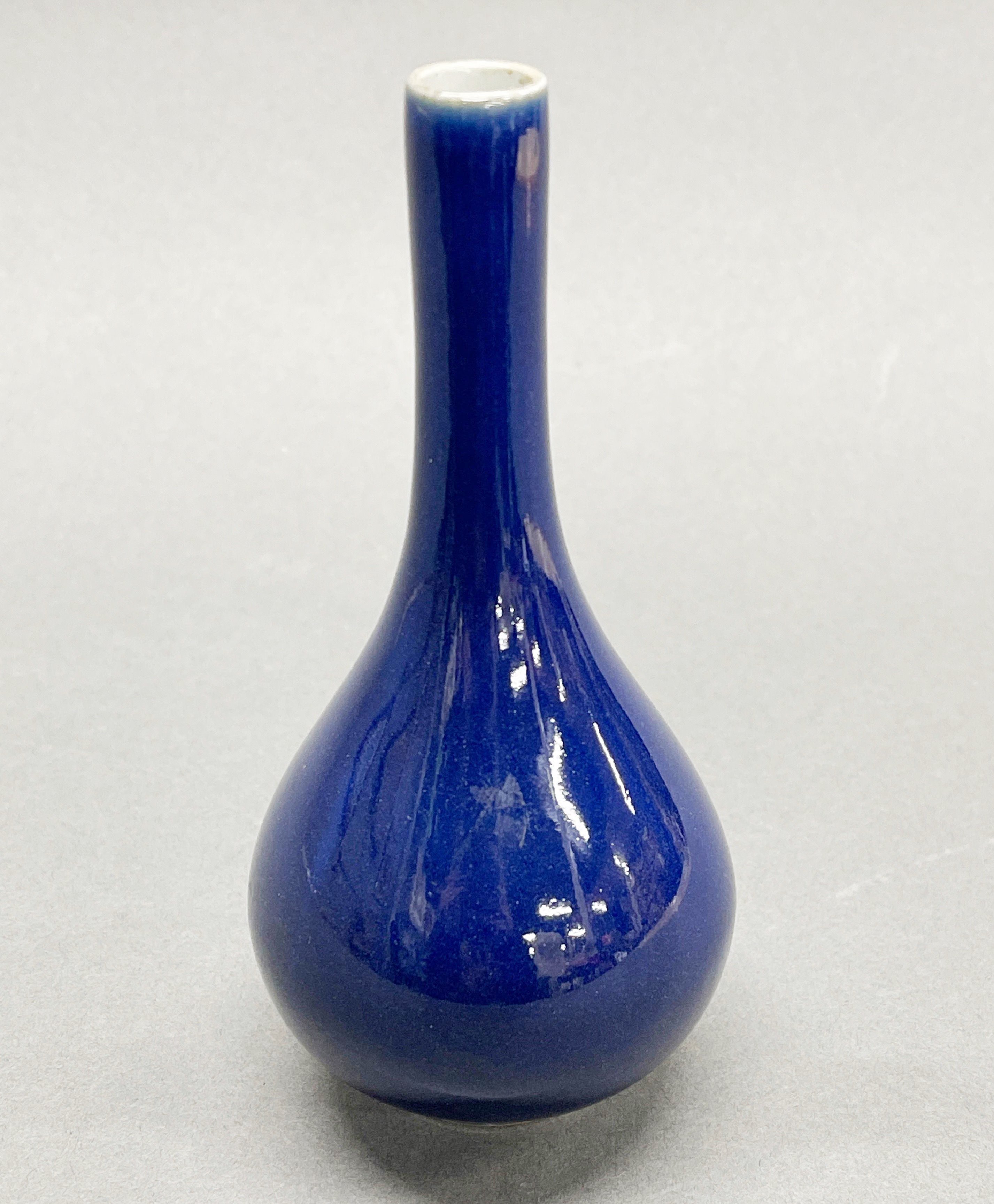 A small Chinese cobalt blue porcelain bud vase, H. 15cm.