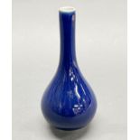 A small Chinese cobalt blue porcelain bud vase, H. 15cm.