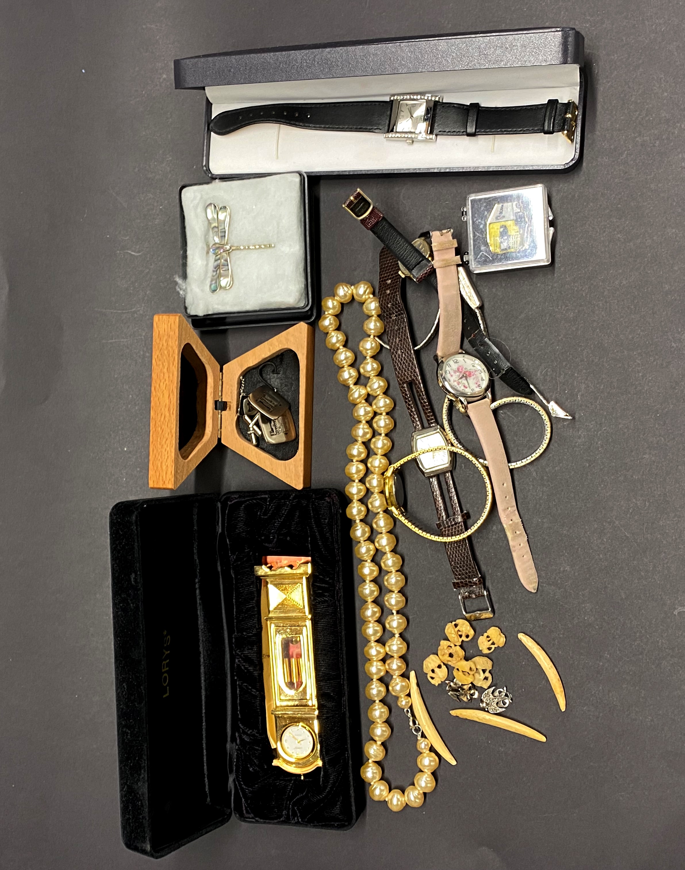 A quantity of mixed watches and other items.