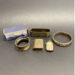 A small hallmarked silver vesta case and other items.