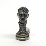 A reproduction bronze Nazi seal featuring Adolf Hitler, H. 8cm.