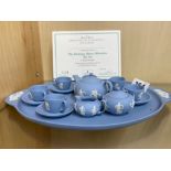 A limited edition Wedgwood porcelain dancing hours miniature tea set.
