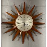 A 1970's Metamec teak and copper finished sun burst clock, Dia. 44cm.