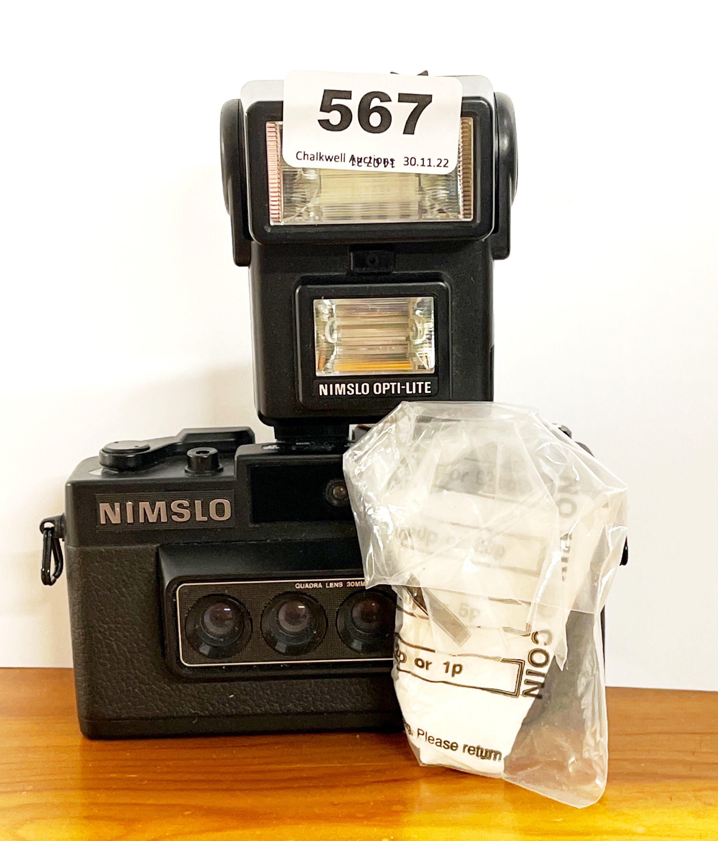 A rare Nimslo quadra lens 30mm camera and flash.