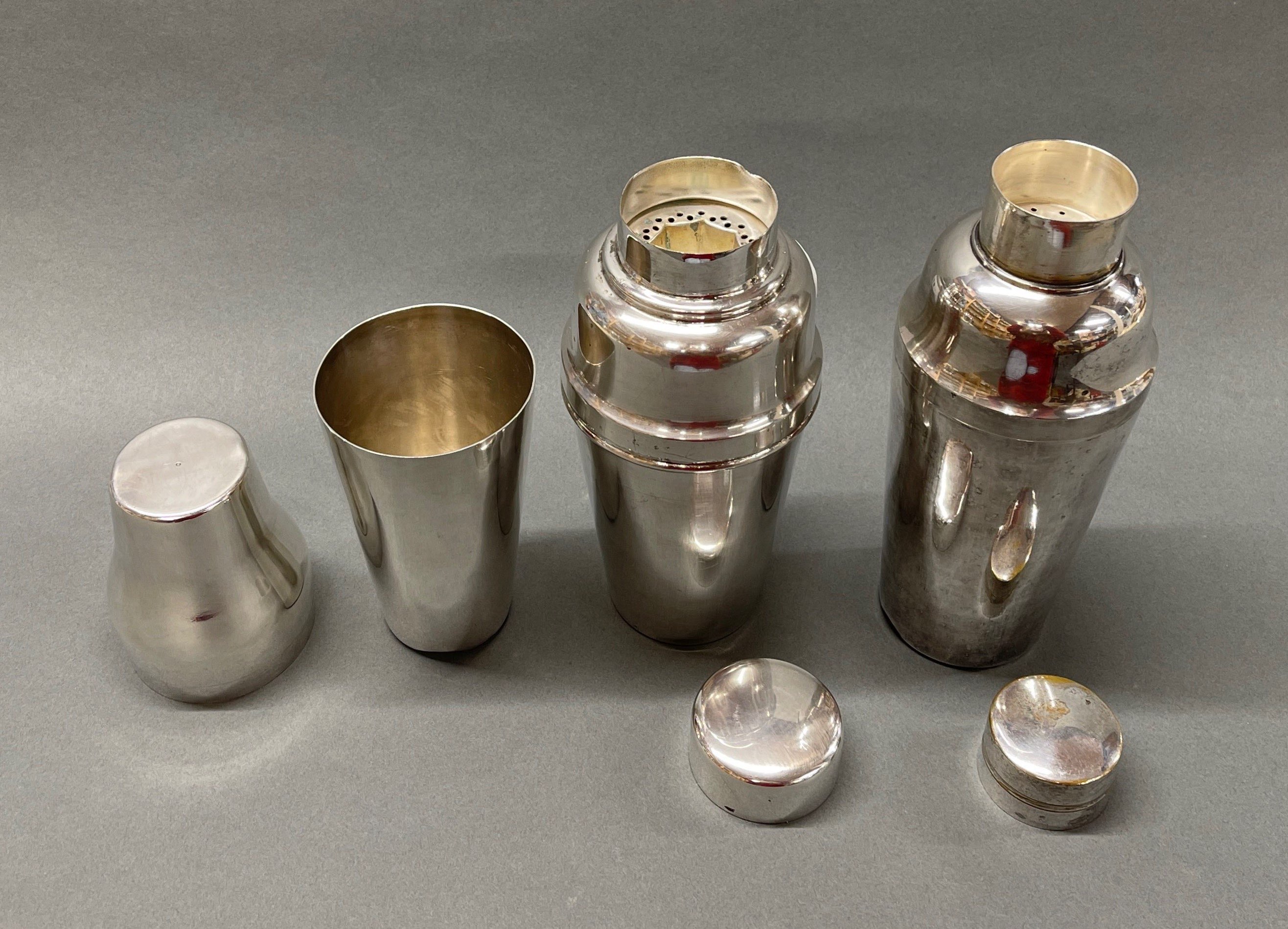 An English Art Deco silver plated cocktail shaker, H. 25cm, together with two further silver - Image 2 of 2