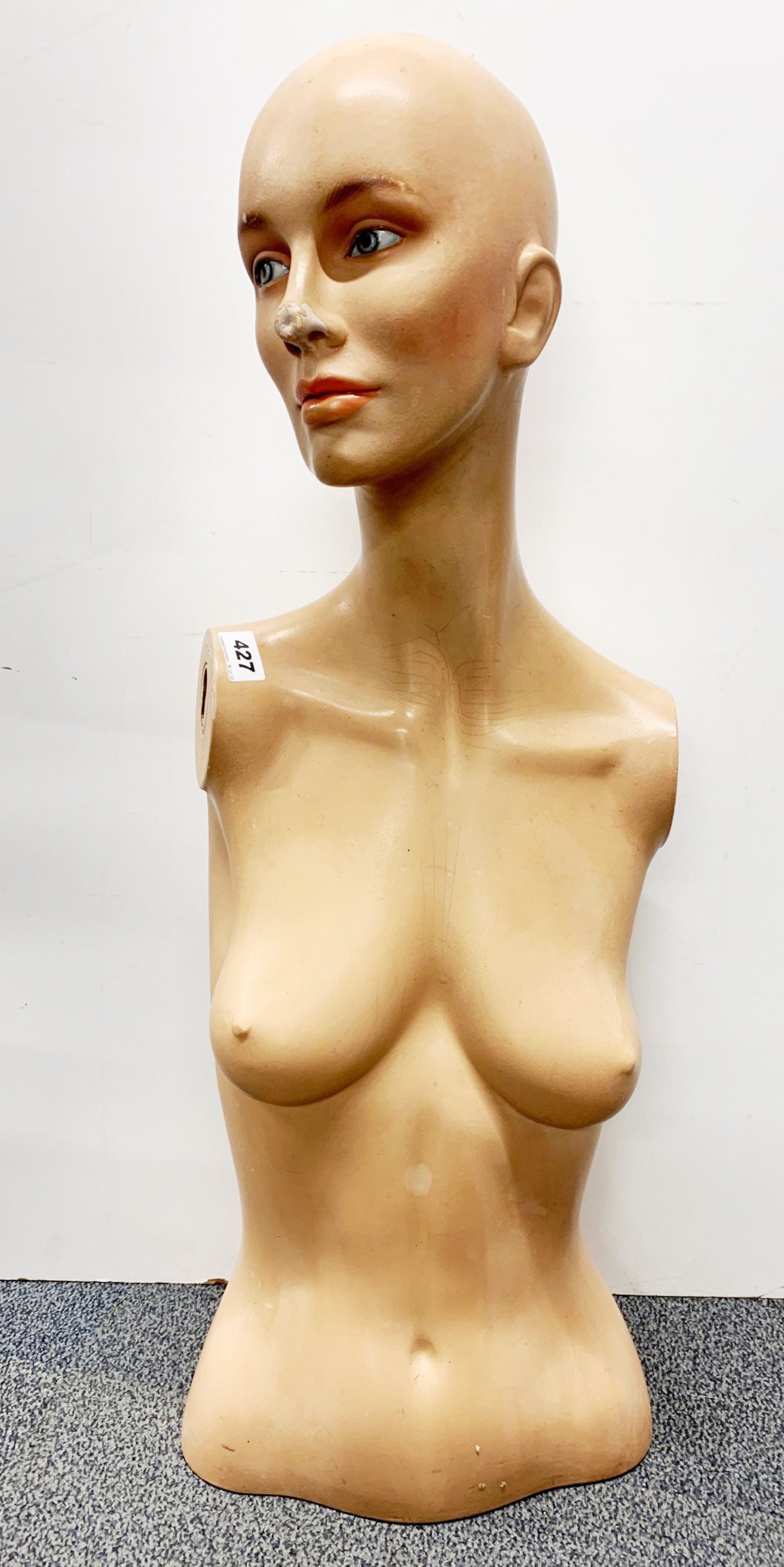 A 1960's painted fibre glass mannequin, H. 79cm.