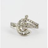 An Art Nouveau style 925 silver ring set with cubic zirconias, (p.5).