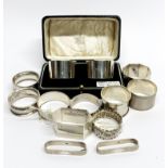A group of thirteen hallmarked silver napkin rings.
