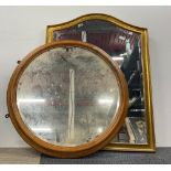 A gilt framed overmantel mirror, W. 69cm, H. 88cm. Together with an oak framed mirror.