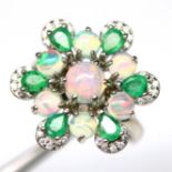 A 925 silver ring set with cabochon cut opals and emeralds, (N.5).