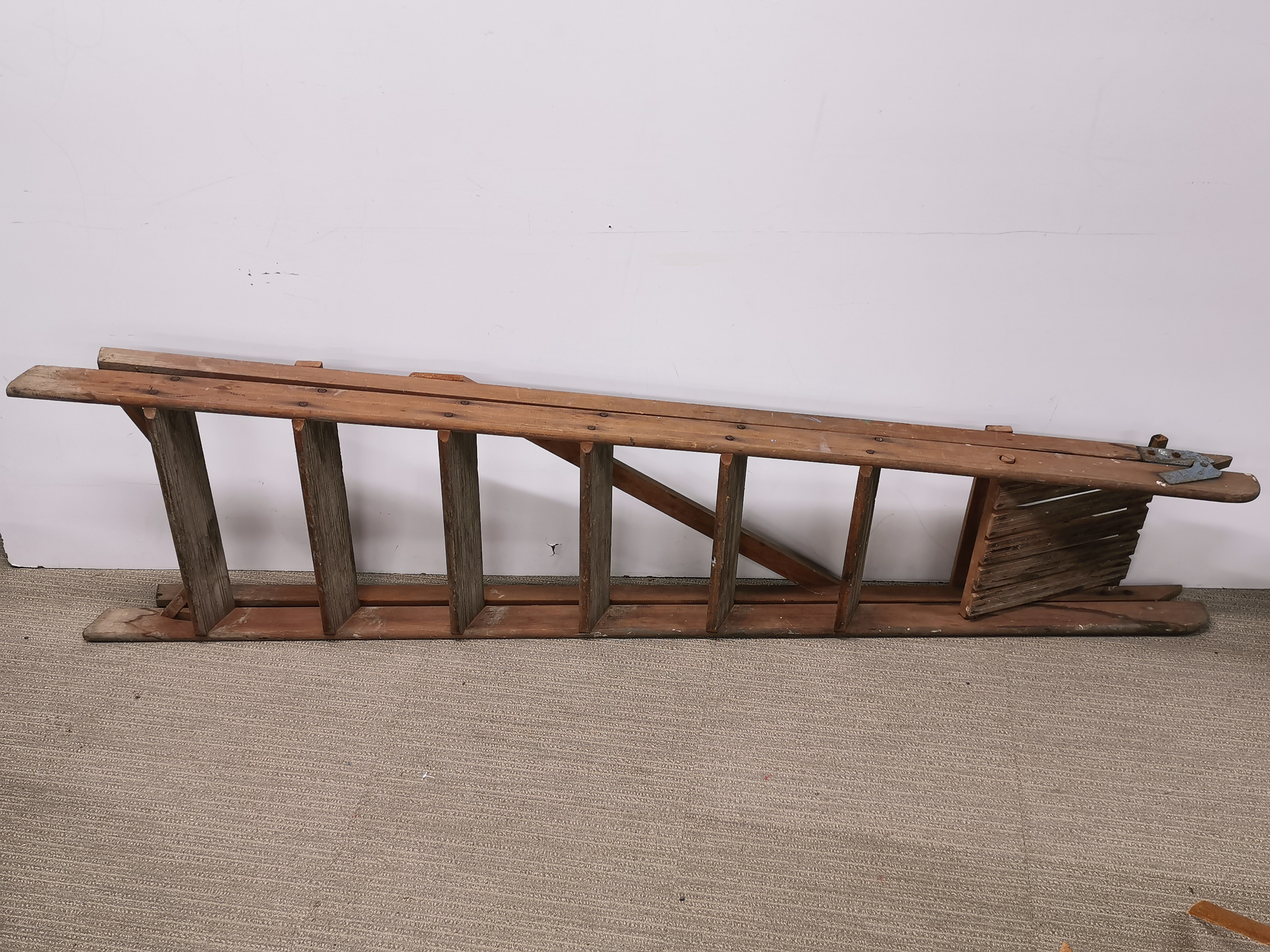 A wooden folding ladder, L. 200cm.