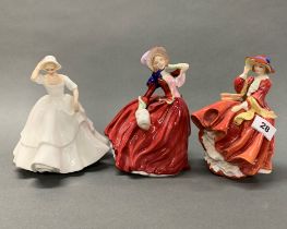 A group of three Royal Doulton porcelain figurines, 'Samantha, Top o' the hill' and 'Autumn