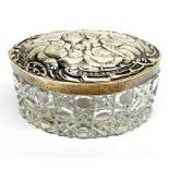A hallmarked silver topped cut glass dressing table pot, W. 9.5cm.