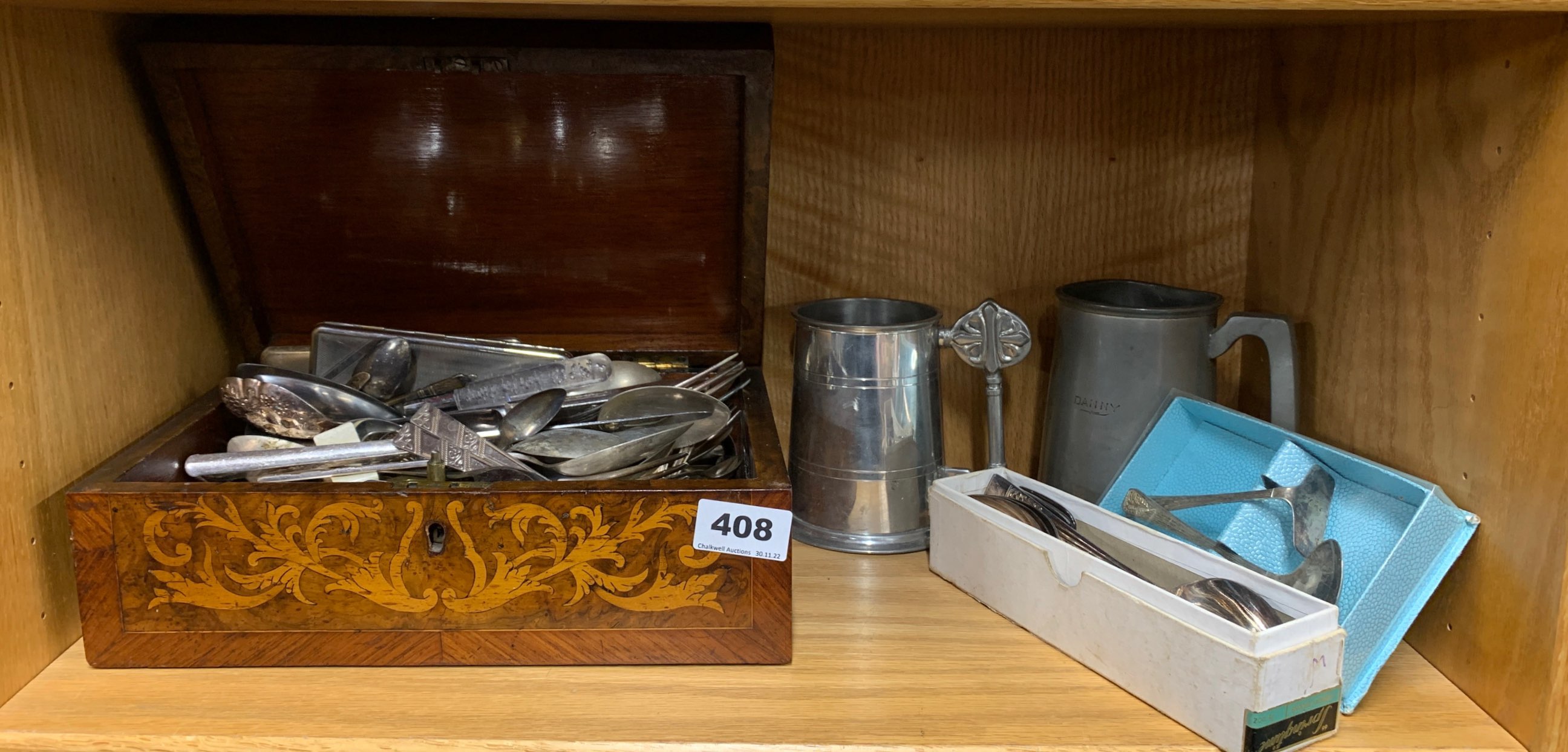 A 19th century inlaid workbox with metalware contents and two tankards.