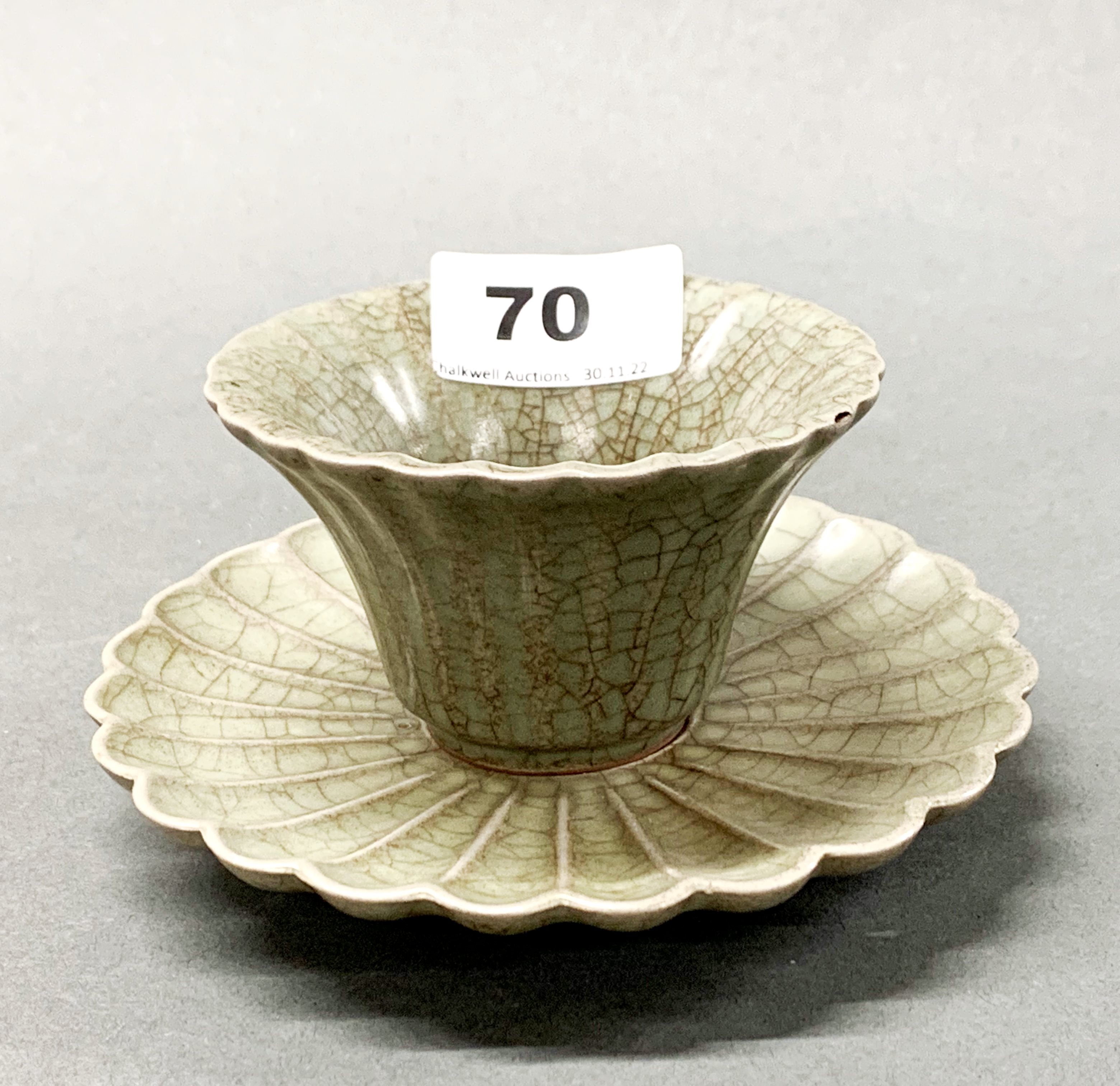 An unusual Chinese lotus shaped crackle celadon glazed terracotta tea bowl and stand, dia. 13cm,