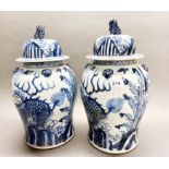 A pair of Chinese provincial porcelain hand painted jars and lids, H. 47cm.