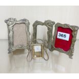 Three small Art Nouveau style brass photograph frames, H. 10cm, and a small Edwardian brass photo