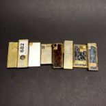 A group of vintage lighters.