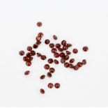 A quantity of unmounted natural garnet, approx. 32.59ct total.