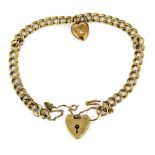 A hallmarked 9ct gold bracelet with heart padlock, L. 30cm.