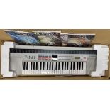 A boxed vintage Hohner keyboard.