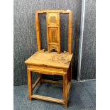 An early 20th century Chinese carved walnut wood splat back chair, H. 109cm.