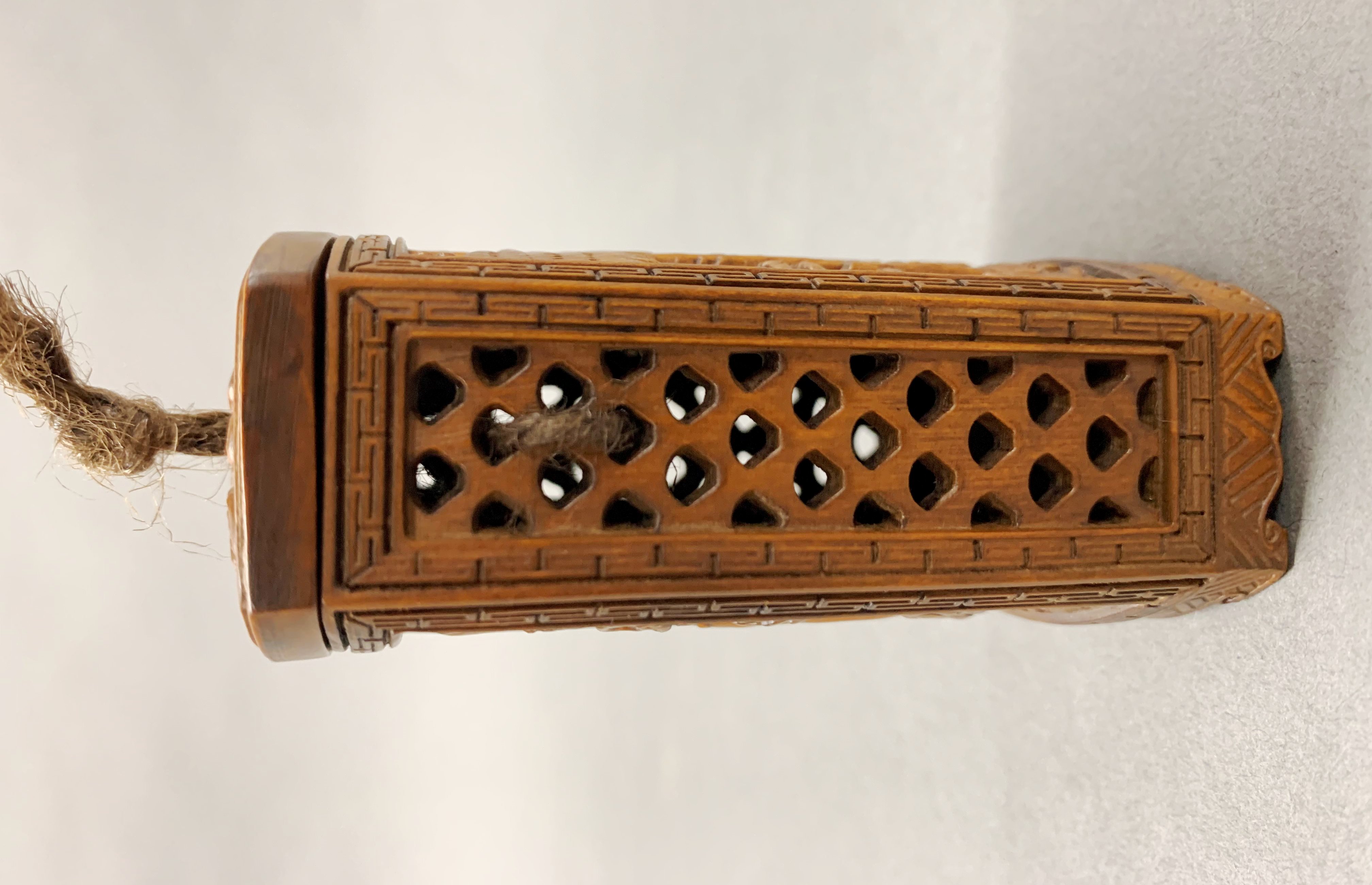 A finely carved Chinese walnut wood pomander, H. 9cm. - Image 2 of 3