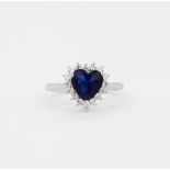 A 925 silver ring set with a heart shaped coloured cubic zirconia surrounded by white cubic