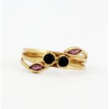 A 9ct yellow gold ruby and sapphire set ring, (M.5).