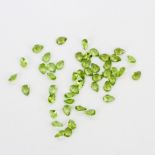 A quantity of unmounted natural peridot, approx. 30.67ct total.