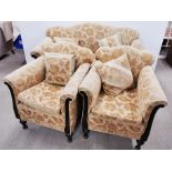 A heavy quality upholstered three piece suite, comprising of a two seater settee and two