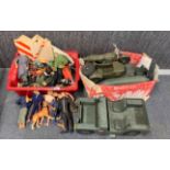 A collection of Action Man figures and accessories.