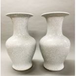 A pair of Chinese crackle glazed porcelain vases, H. 36cm.
