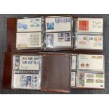 Four albums of Royal Mail presentation pack stamps.