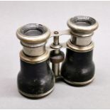 A pair of antique Le Jockey club field glasses.