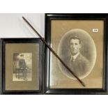 An officer's swagger stick with two photographs, one featuring the stick. Larger photograph frame