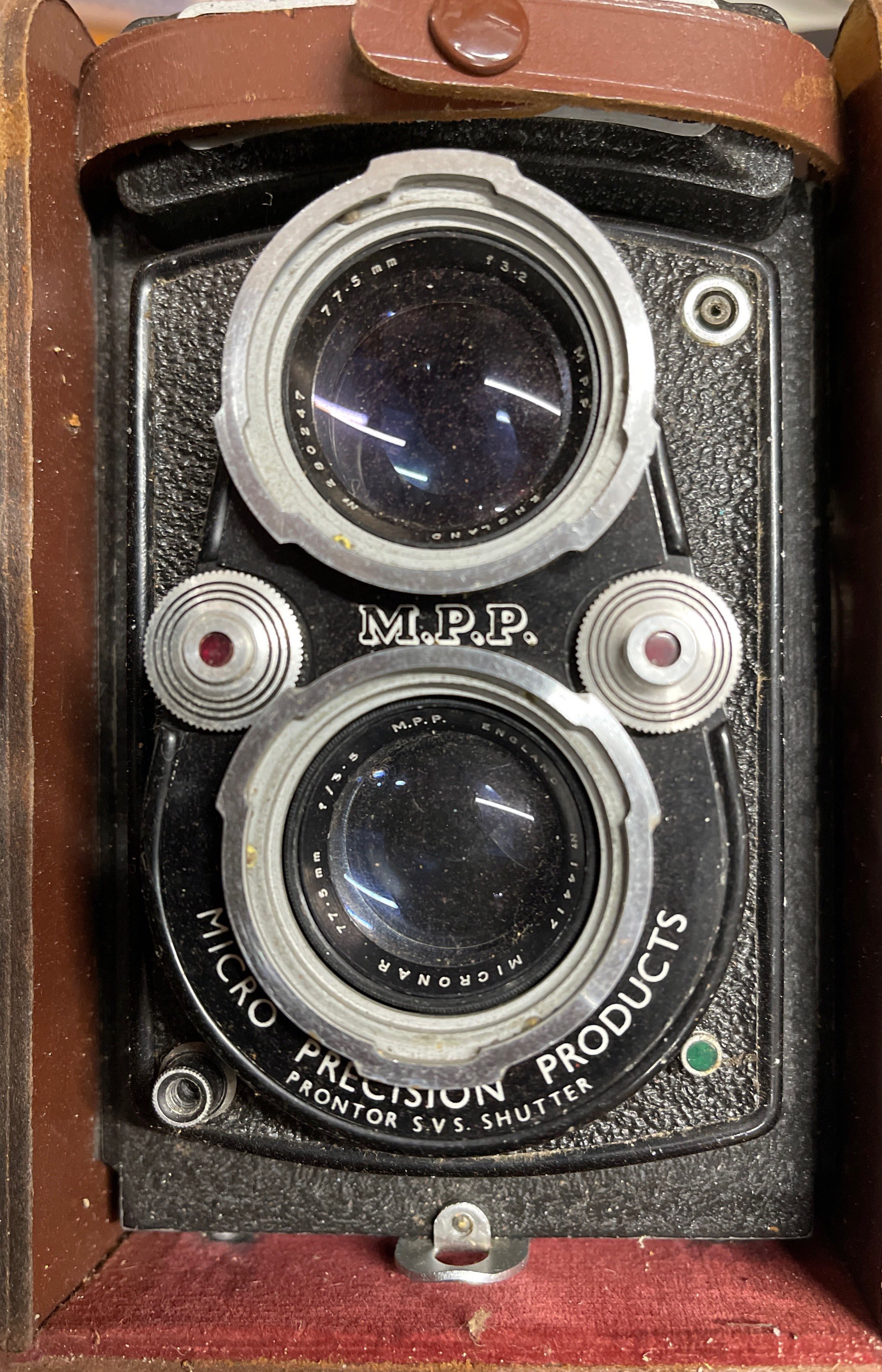 A MicroFlex MPP twin lens reflex camera with a three clasp spirit case, and an Olympus camera. - Image 2 of 2