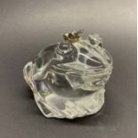 A large crystal frog wearing a sapphire set crown, acid etched for 1988 FIA, L. 12cm, H. 9cm.