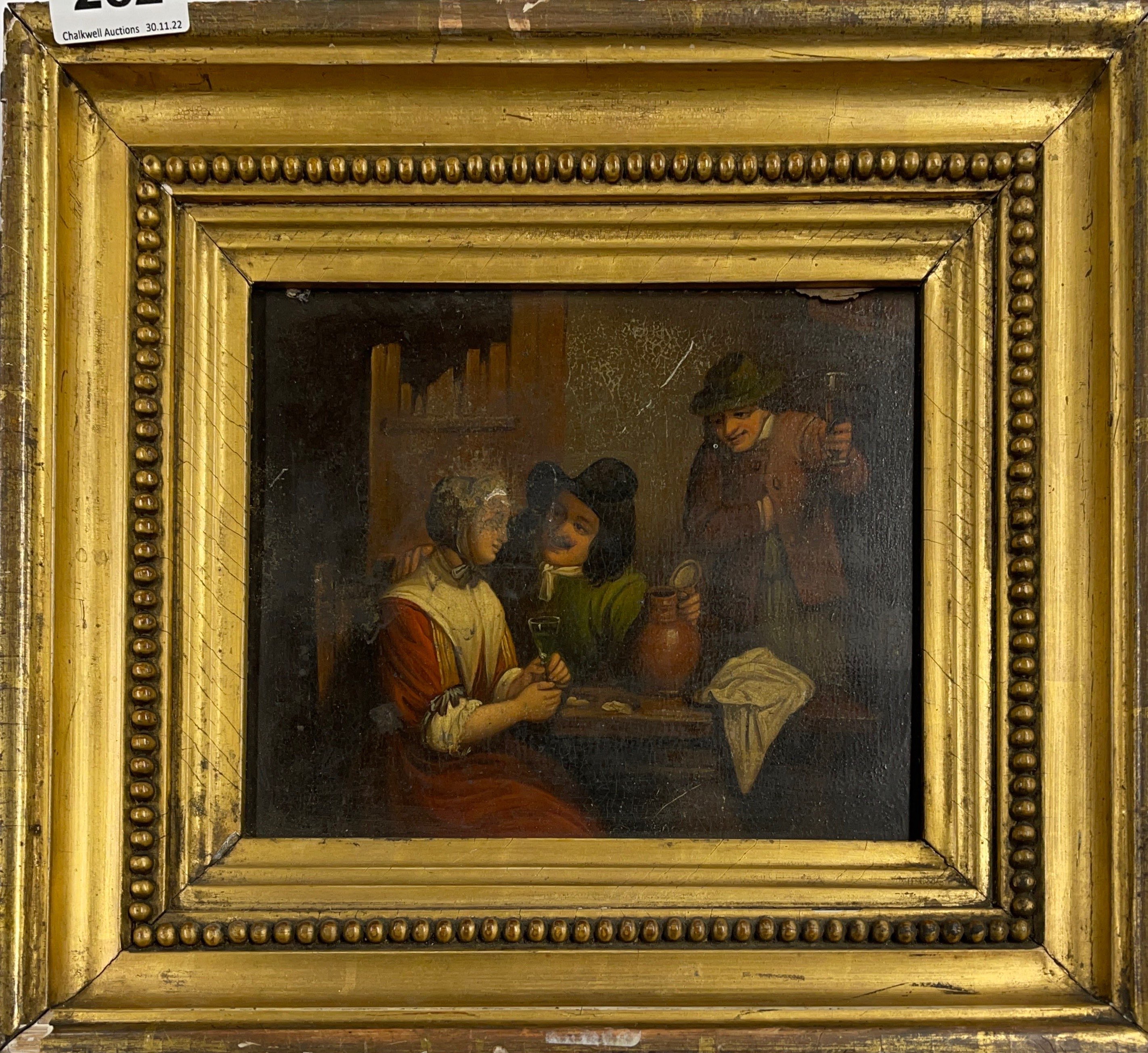 An 18th century gilt framed oil on board interior scene, frame size 33 x 28cm.