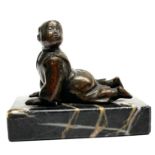 A small early 20th century Japanese bronze figure of a boy on a marble base, L. 6cm, H. 5cm.