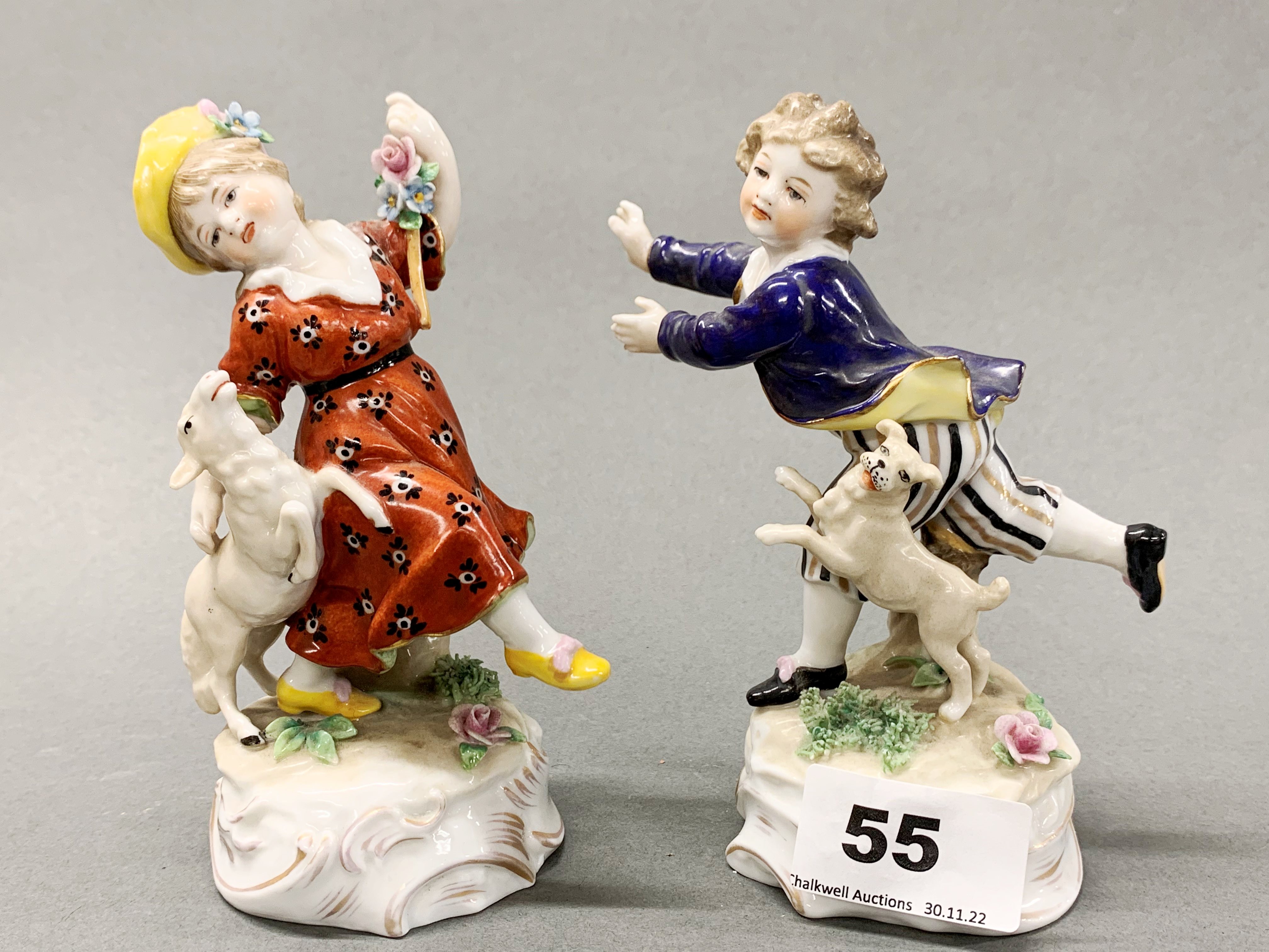 A pair of Vienna porcelain figurines of children, H. 14cm.