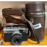 A MicroFlex MPP twin lens reflex camera with a three clasp spirit case, and an Olympus camera.