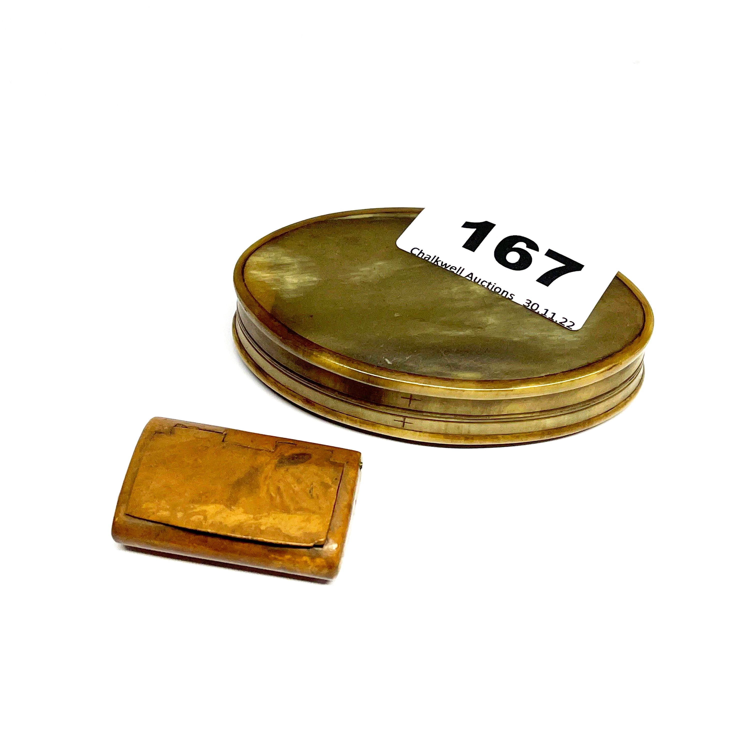 An early 19th century horn snuff box with a small 18th century walnut snuff box, larger W. 8cm.