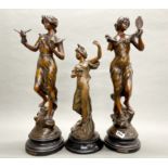 A pair of 19th century bronzed spelter figures of young women, one with detached arm, H. 58cm.