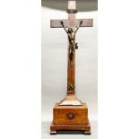 An 18th century bronze and rosewood veneered crucifix, H. 75cm.