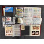 An extensive quantity of Tuvalu stamps in six albums.