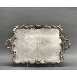 A superb large silver plated butler's tray, W. 80cm, with large purpose made Perspex stand.