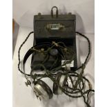 An early bakelite BBC radio tuner and headset.