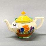 A Clarice Cliff small crocus pattern tea pot, c. 1930, H. 12cm.